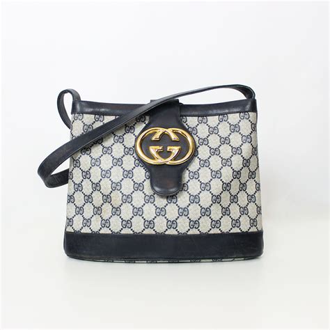 gucci symbol on purse|old Gucci emblem.